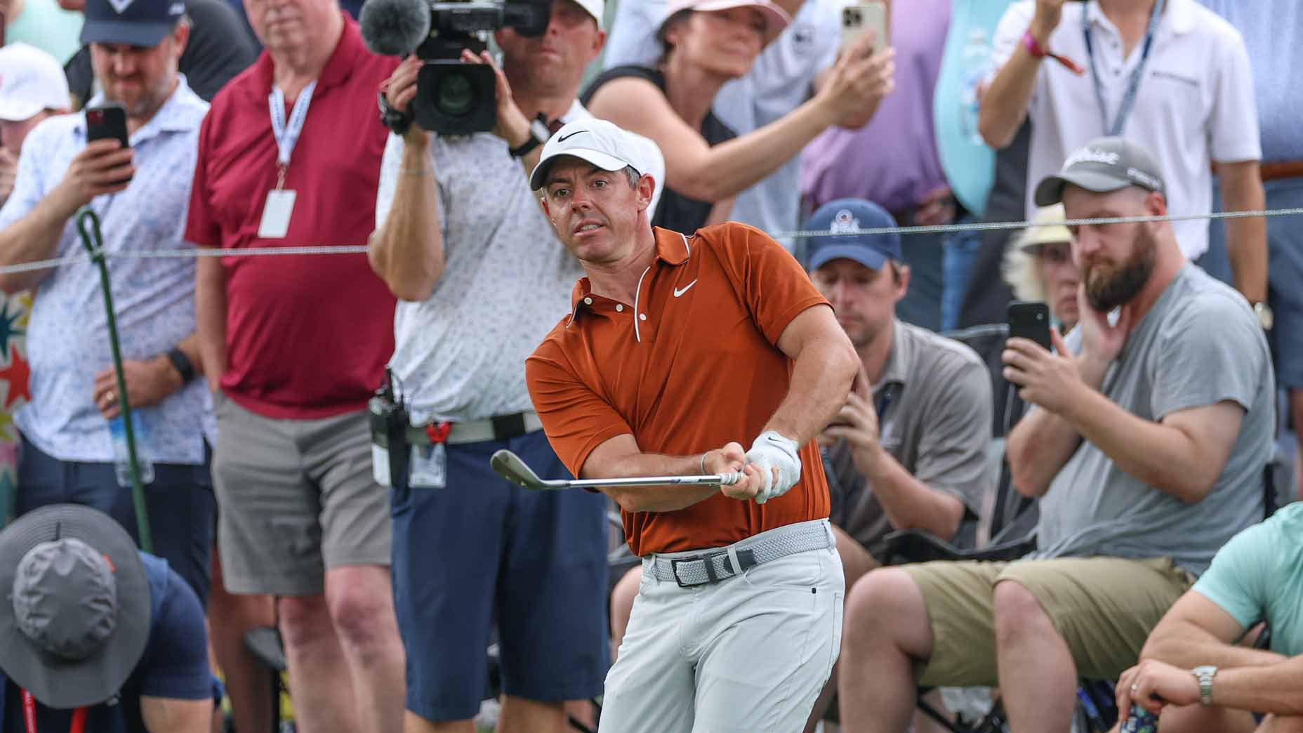 PGA Tour pro Rory McIlroy, betting favorite in 2025 RBC Canadian Open odds, plays shot on the eighth hole during the 2025 PGA Championship.