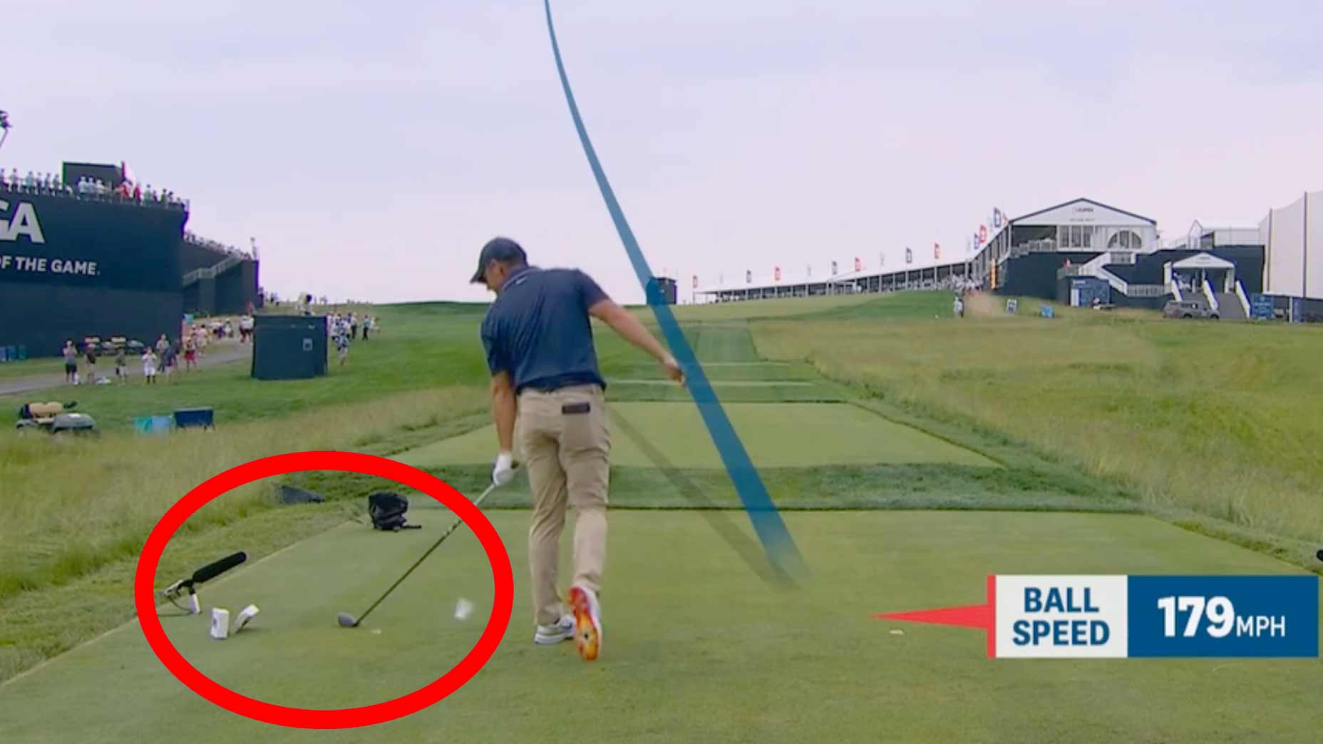 Rory McIlroy smashes a 2025 U.S. Open tee marker with his club on the 17th hole at Oakmont.