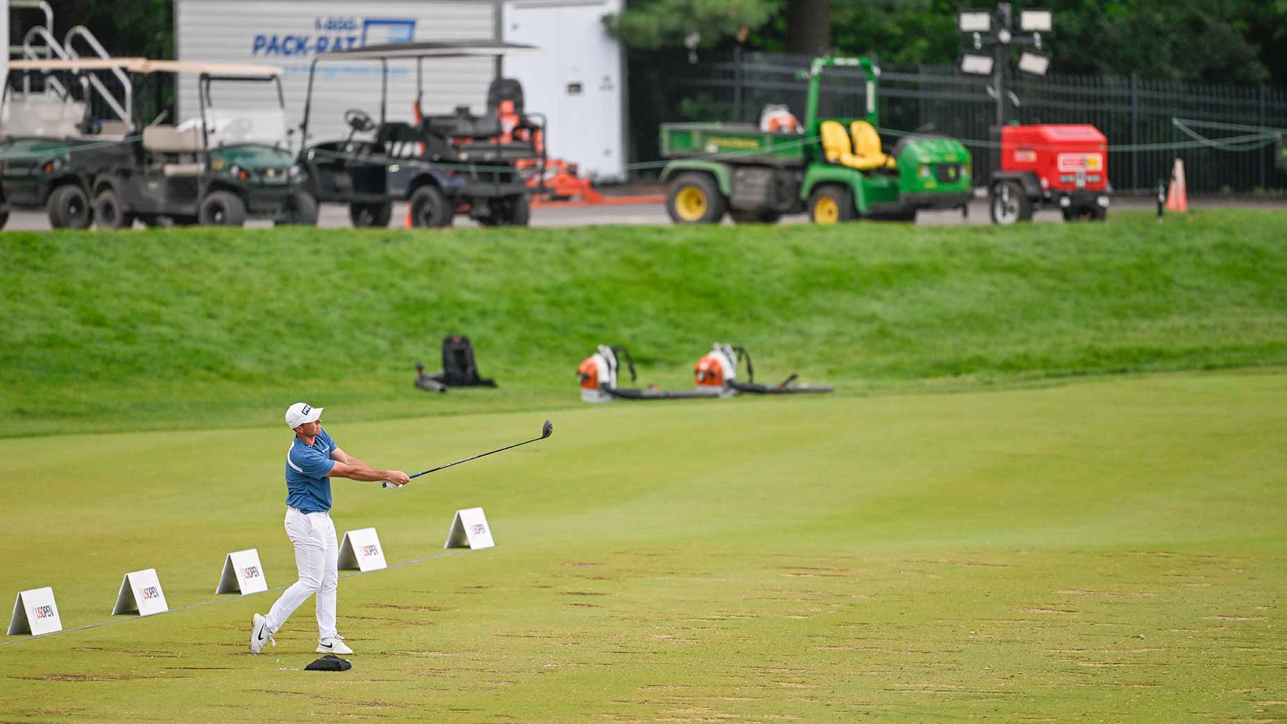viktor hovland swings driver on the range at the u.s. open