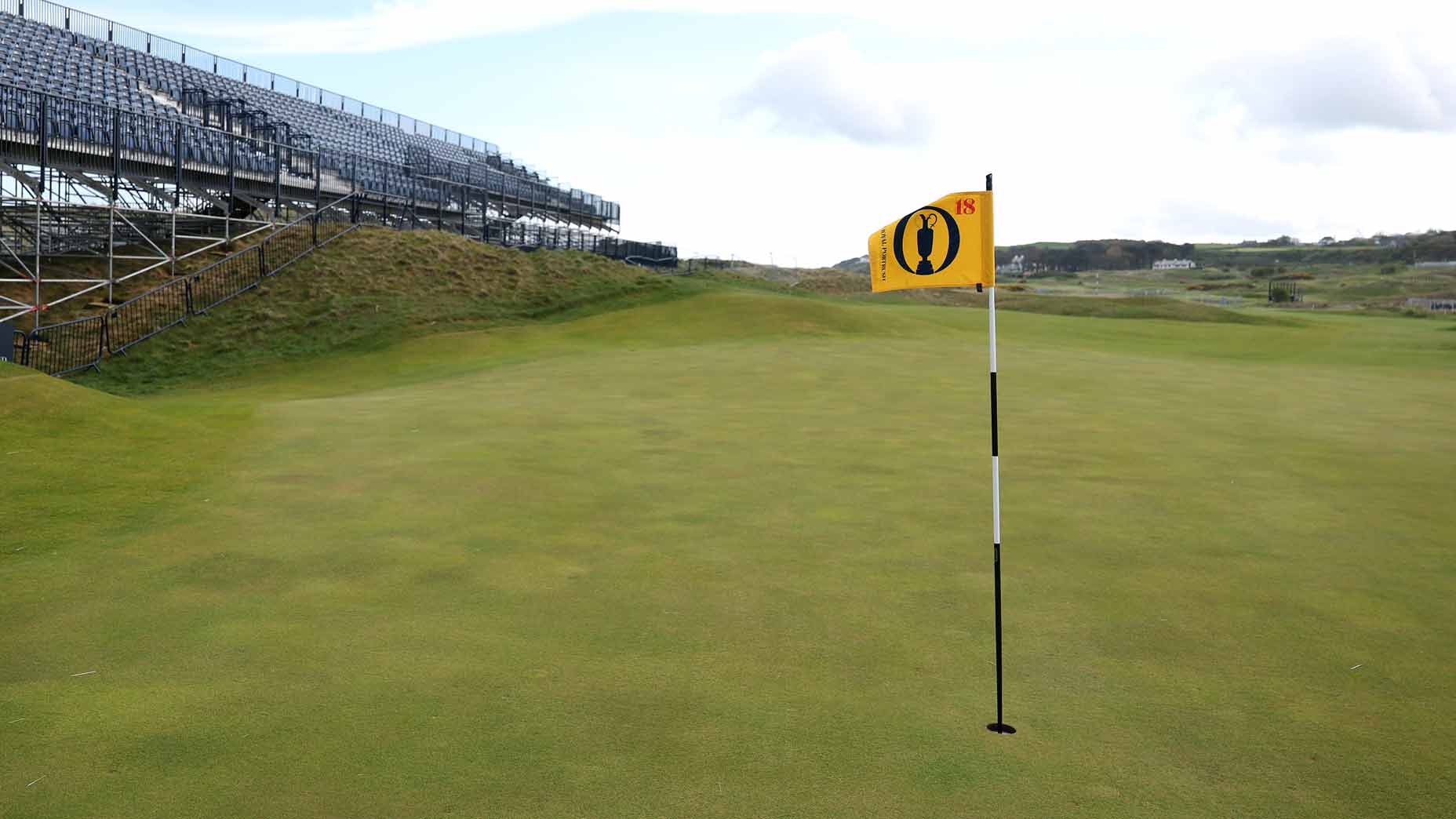 2025 Open Championship flag on green seen at Royal Portrush Golf Club.