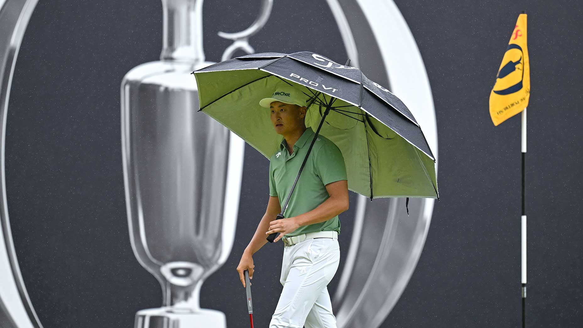 Haotong Li walks on the 18th green during the second round of the 2025 Open Championship at Royal Portrush on Friday.