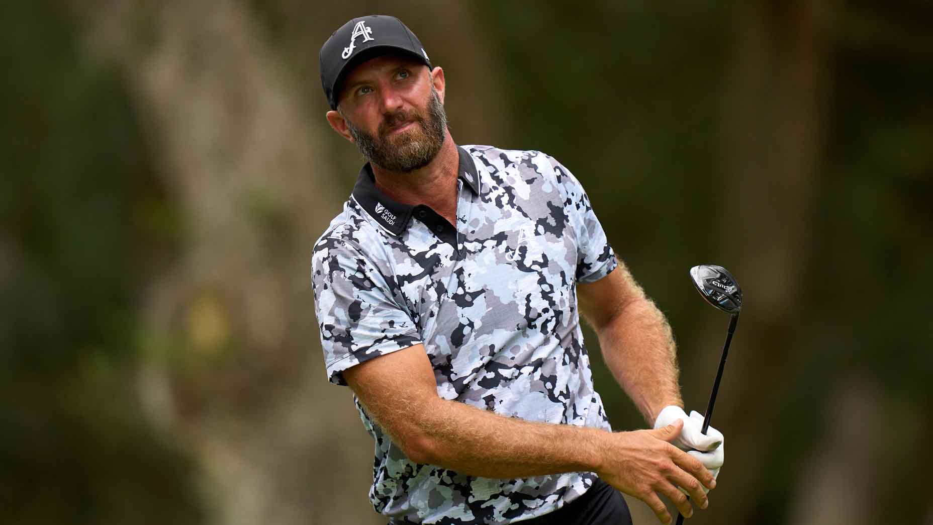 Dustin Johnson hits a shot during LIV Andalucia