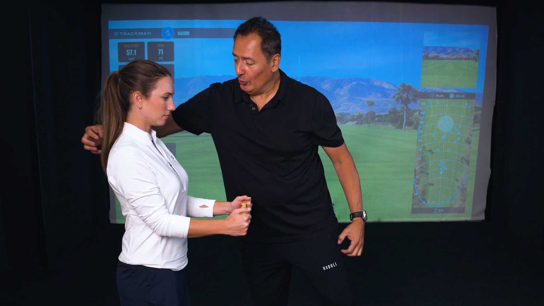 Marty Jaramillo explaining shoulder exercise.