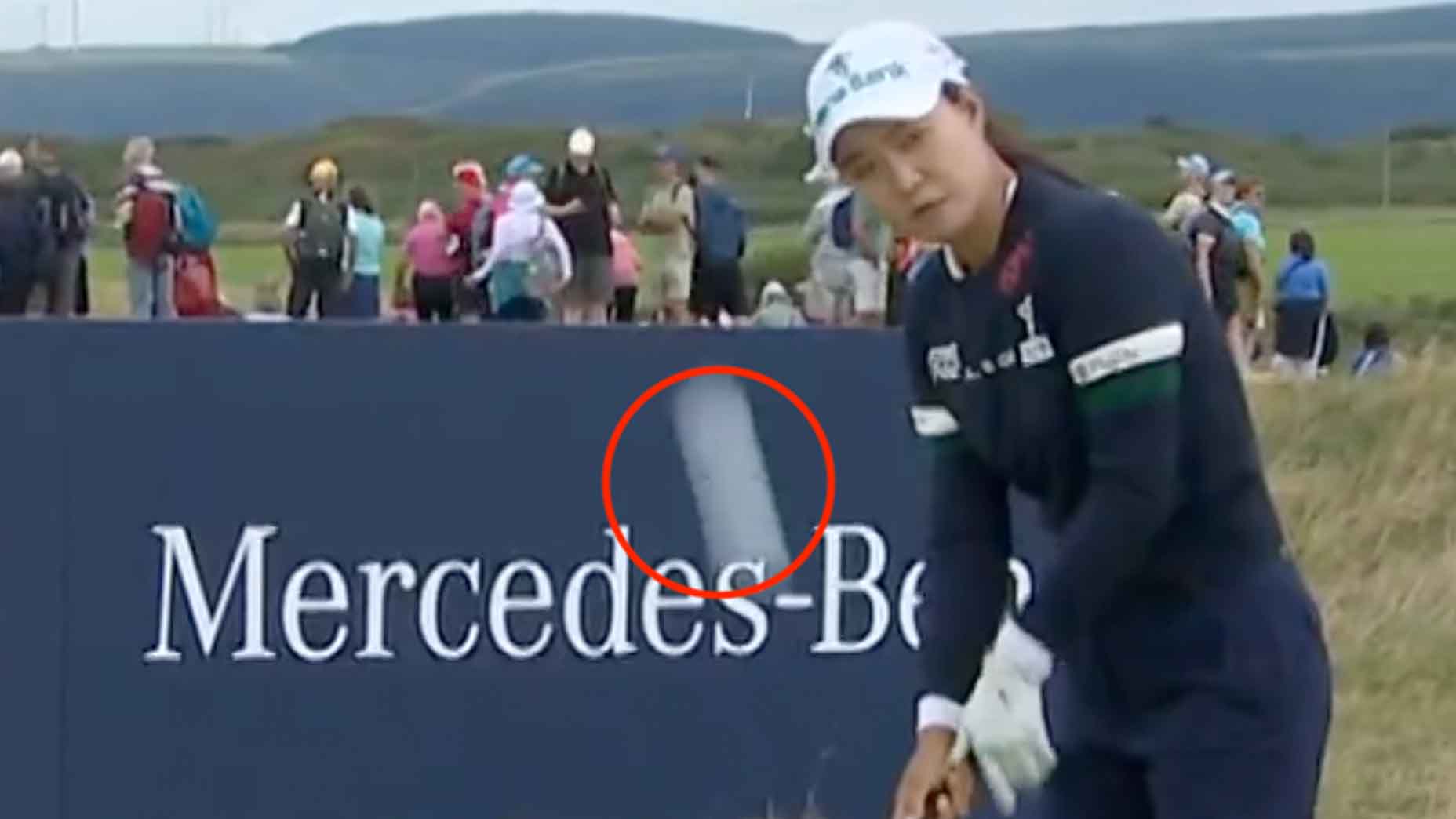 Minjee Lee prepares to hit a shot as Charley Hull's ball flies past her
