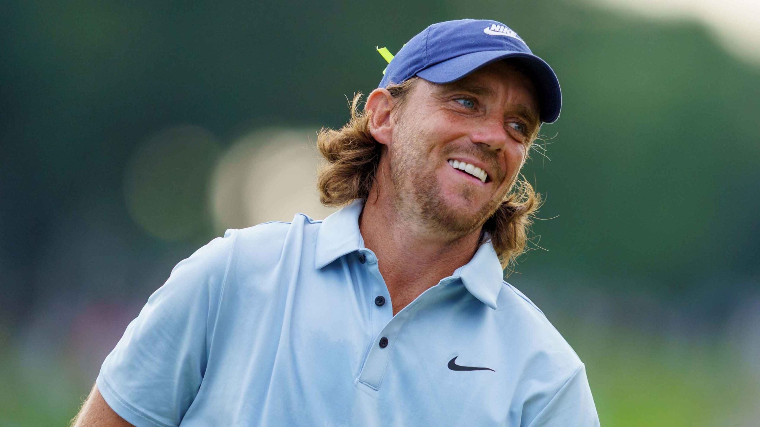 Tommy Fleetwood of England reacts to the fans cheering during the final round of the TOUR Championship 2025 at East Lake Golf Club