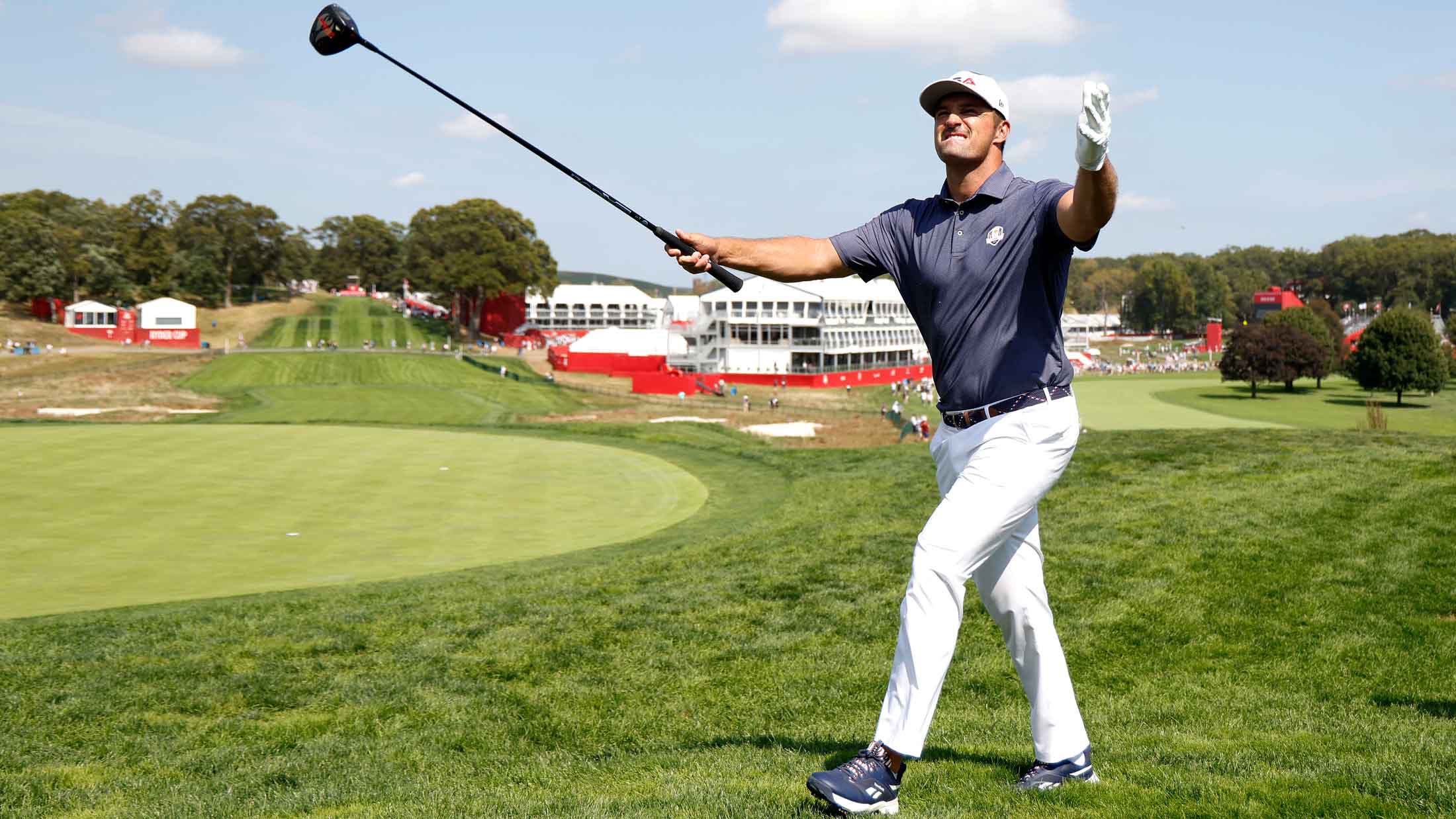 Bryson DeChambeau of Team United States acknowledges the crowd while playing the 18th hole prior to the Ryder Cup 2025