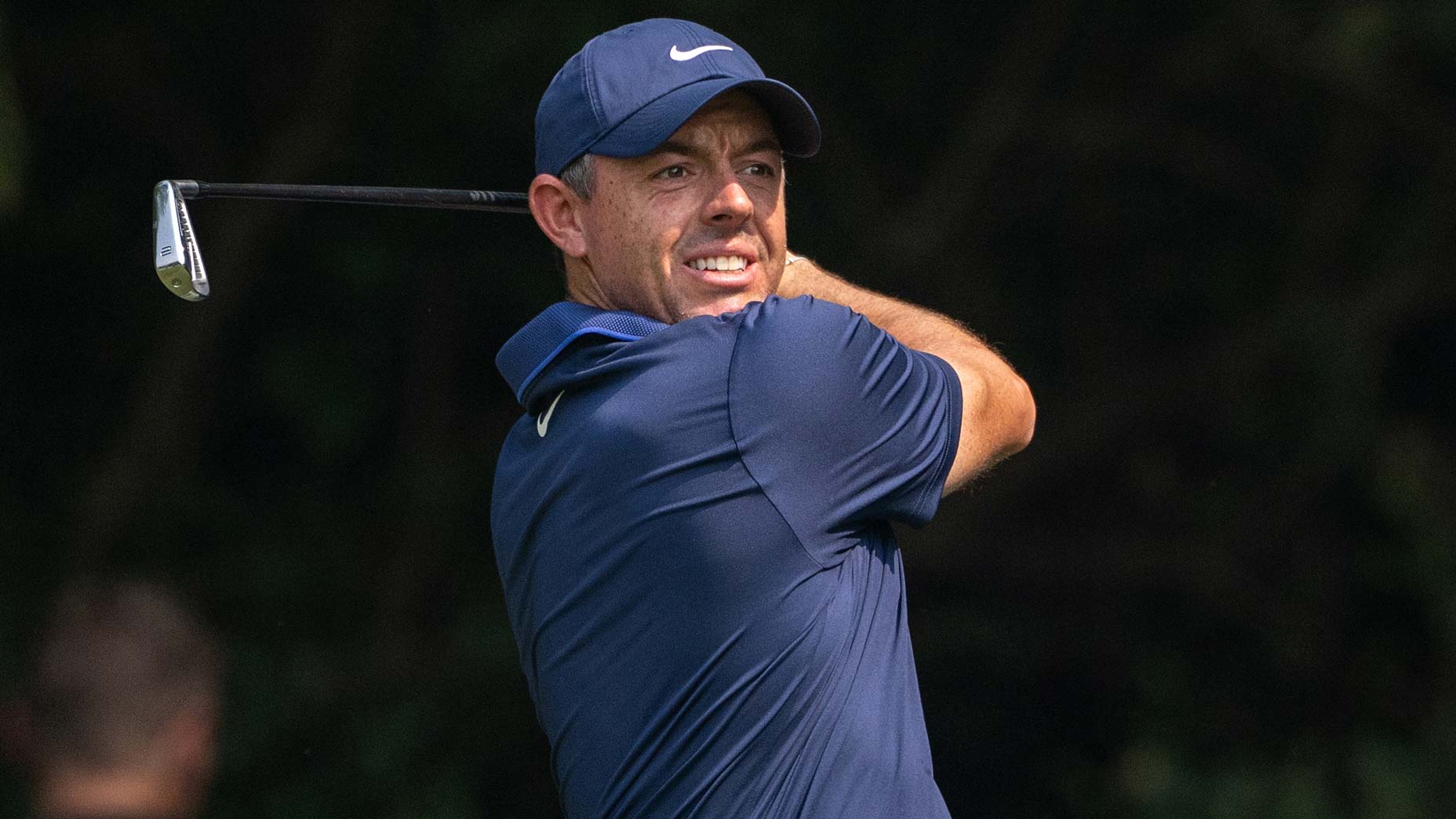 Rory McIlroy hitting 2-iron at Delhi Golf Club.