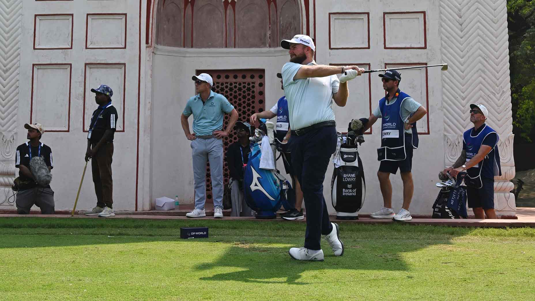 Shane Lowry tees off during the 2025 DP World India Championship.