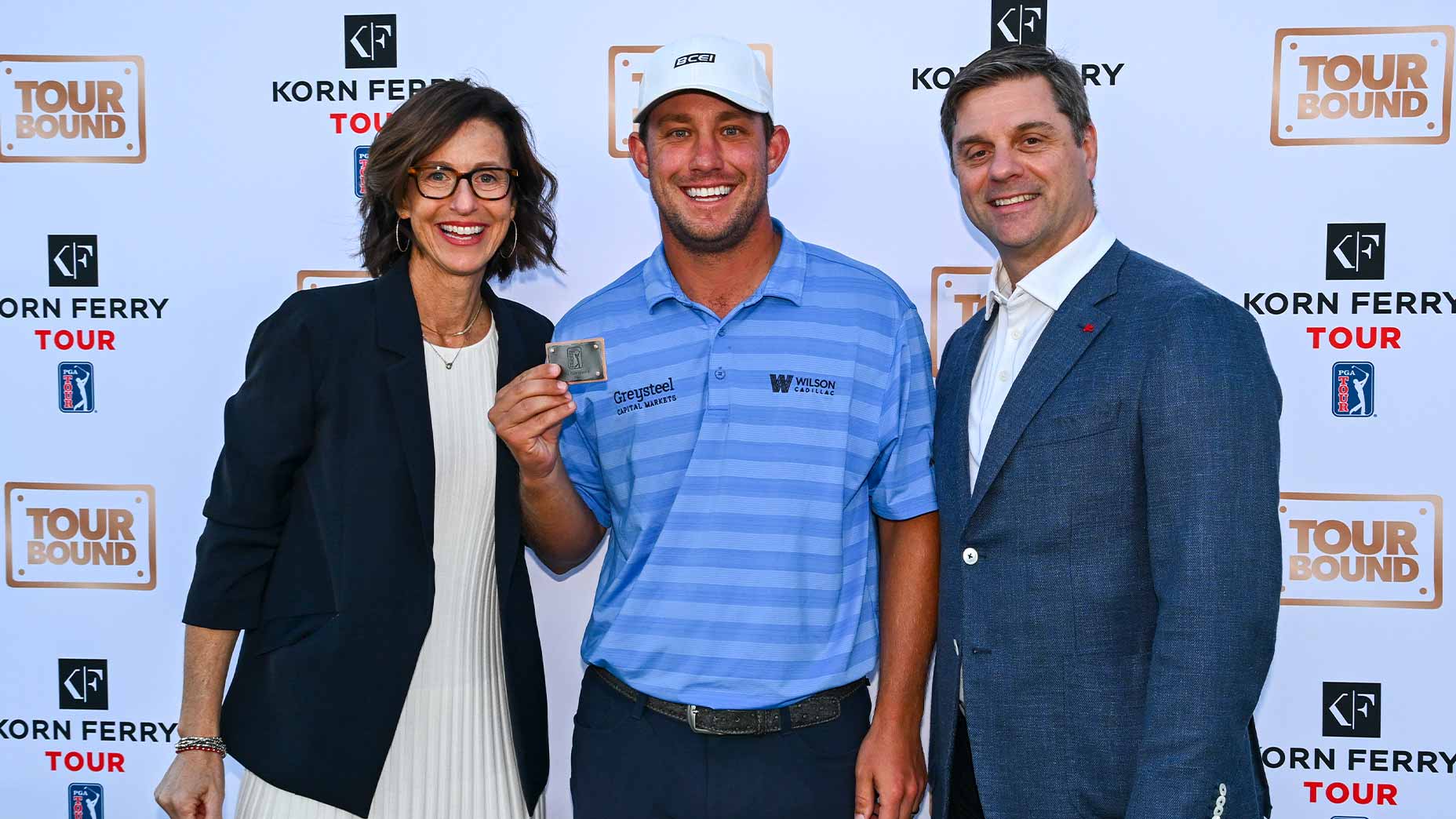 zach bauchou smiles next to brian rolapp at PGA Tour korn ferry tour graduation
