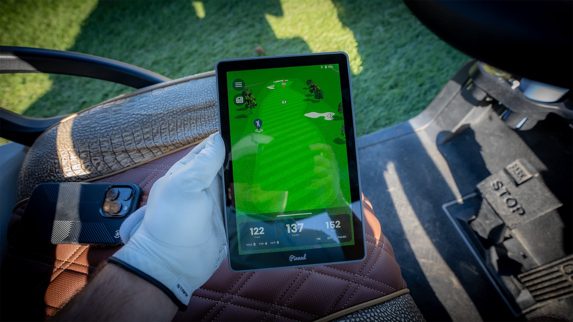 Holding the Pinned Golf Caddie