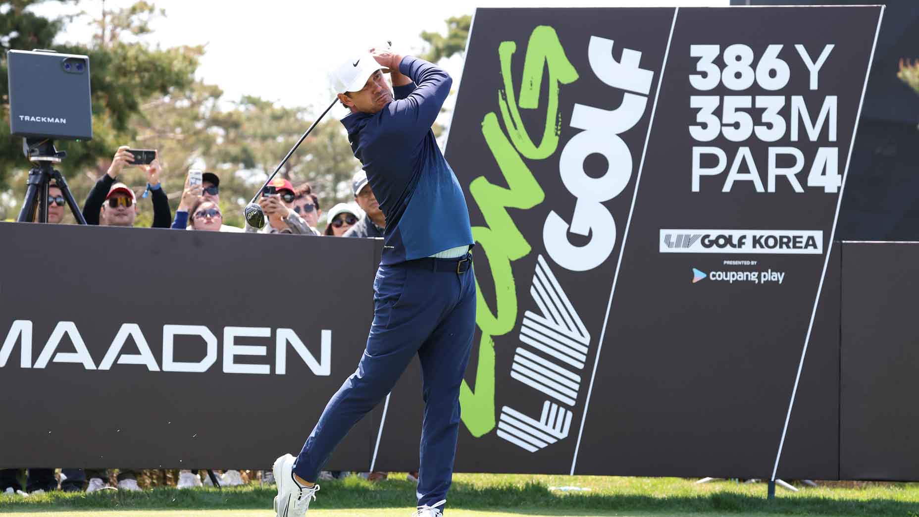 Brooks Koepka hits a tee shot at LIV Korea
