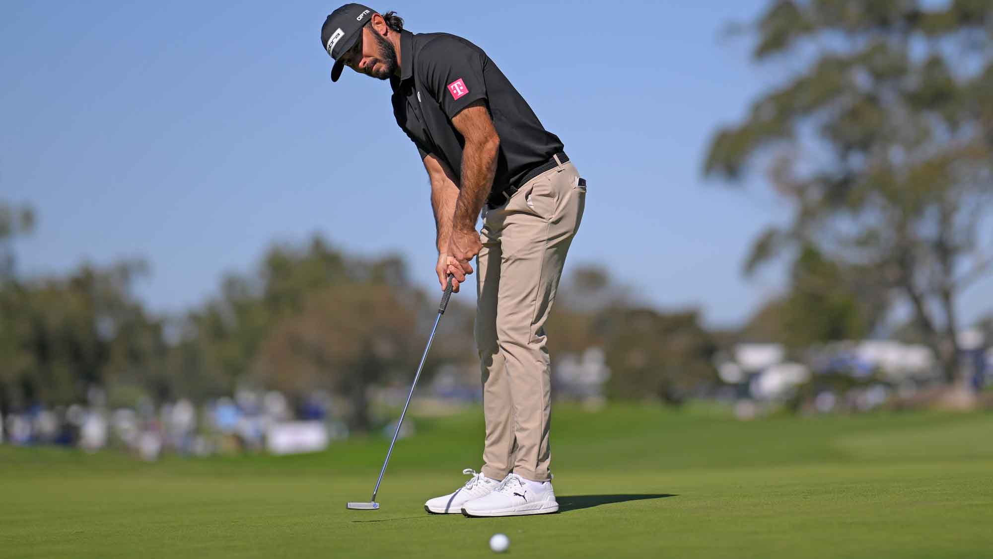 Max Homa of the United States putts on the tenth hole during the first round of the Farmers Insurance Open 2026 at Torrey Pines South Course