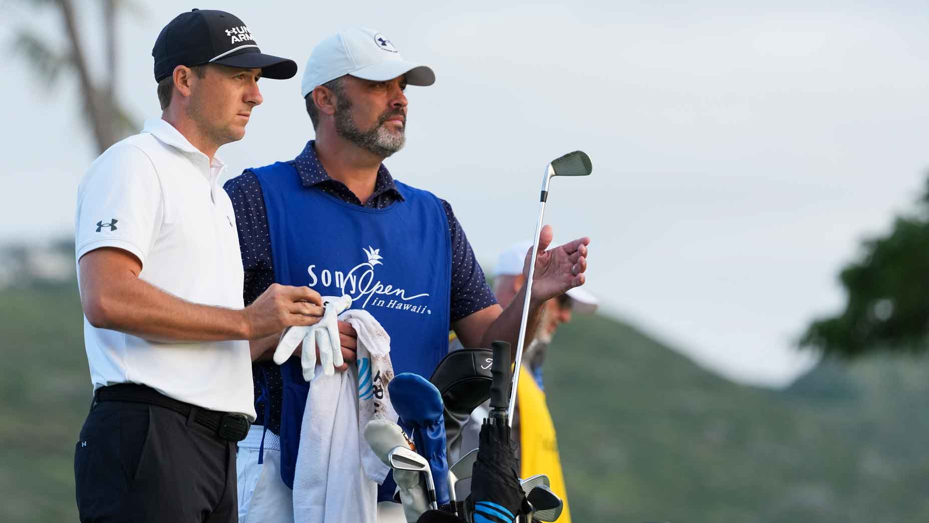 Jordan Spieth with his caddie Michael Greller on the 11th hole during the second round of Sony Open in Hawaii at Waialae Country Club on January 16, 2026 in Honolulu, Hawaii.