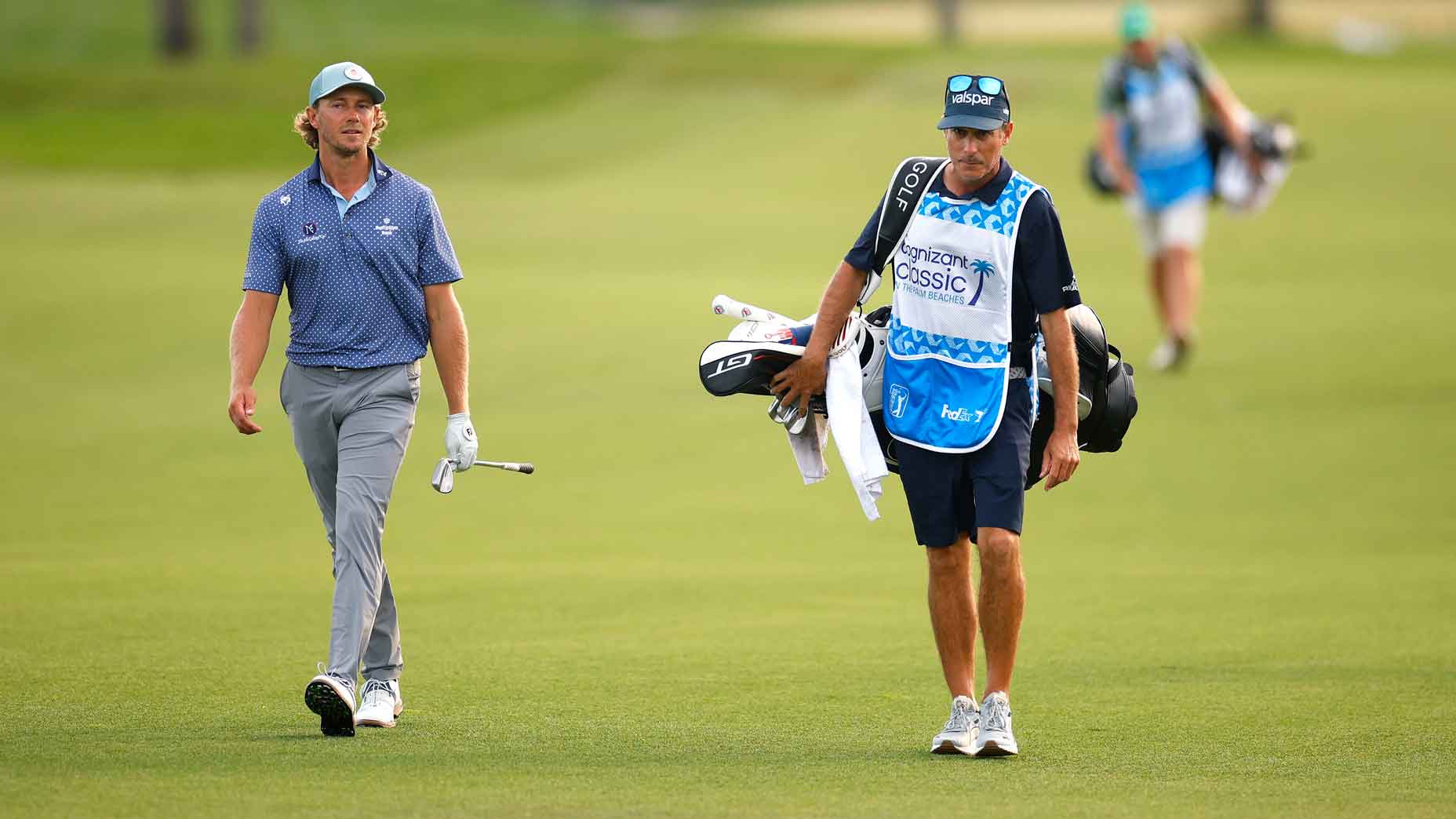 Austin Smotherman of the United States walks the eighth hole alongside his caddie during the second round of the Cognizant Classic 2026 at PGA National Resort And Spa on February 27, 2026 in Palm Beach Gardens, Florida. (Photo by Mike Ehrmann/Getty Images)