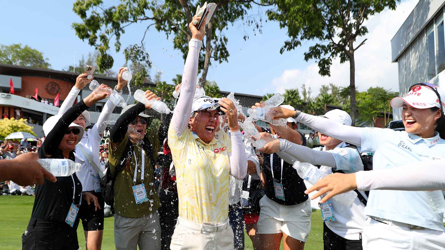 eeno Thitikul of Thailand is congratulated with water as she celebrates victory following the final round of the Honda LPGA Thailand 2026 at Siam Country Club on February 22, 2026 in Chon Buri, Thailand. (Photo by Thananuwat Srirasant/Getty Images)