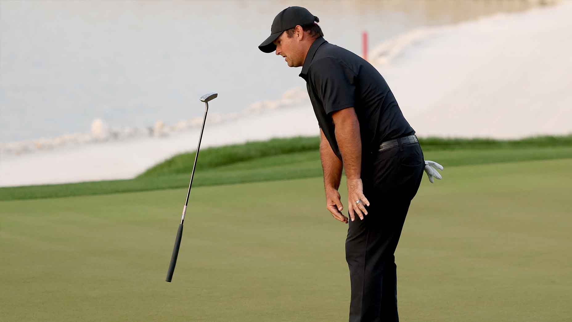 Patrick Reed reacts to a missed putt at the Bahrain Championship