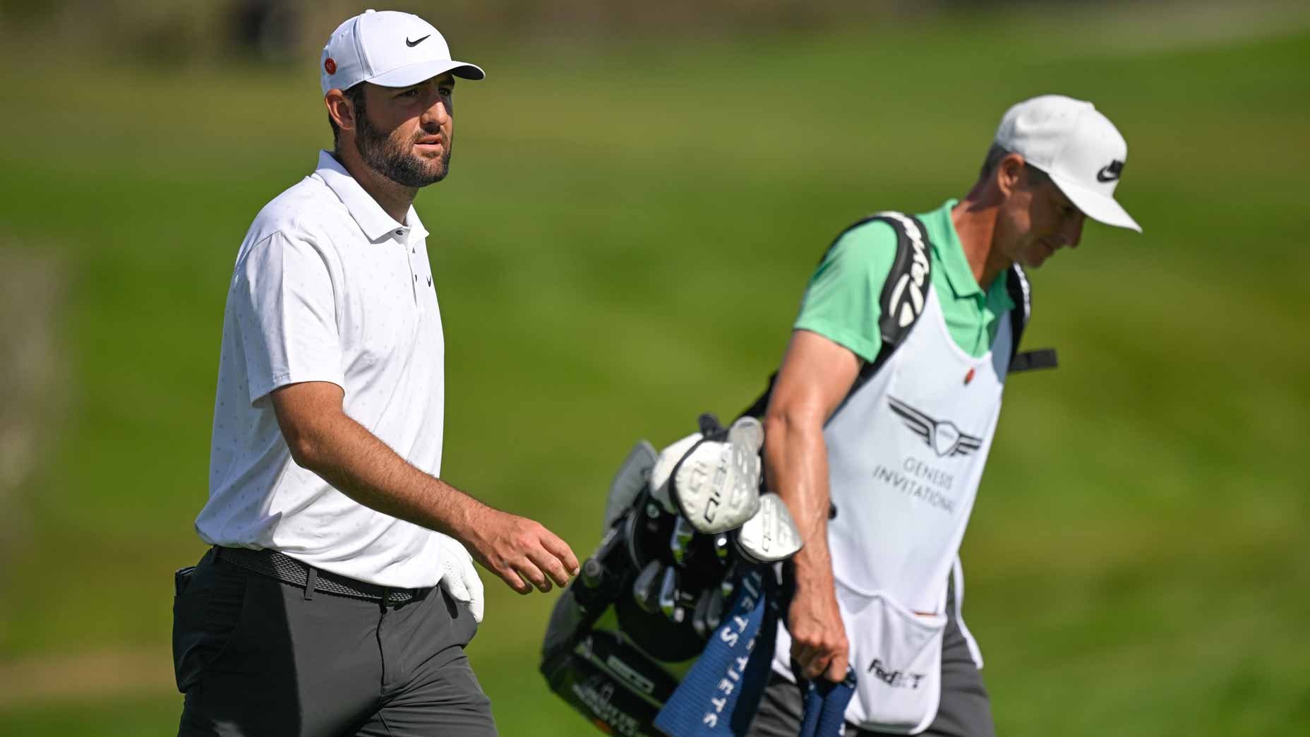 2026 Genesis Invitational: Scottie Scheffler walks with caddie at 2025 event.