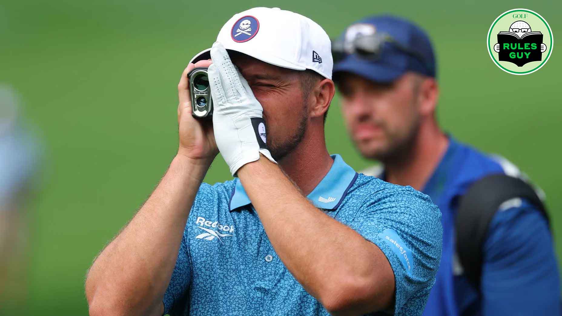 Bryson DeChambeau of the United States uses a rangefinder before hitting an approach shot on the 12th hole during the second round of the PGA Championship at Quail Hollow Country Club on May 16, 2025 in Charlotte, North Carolina.