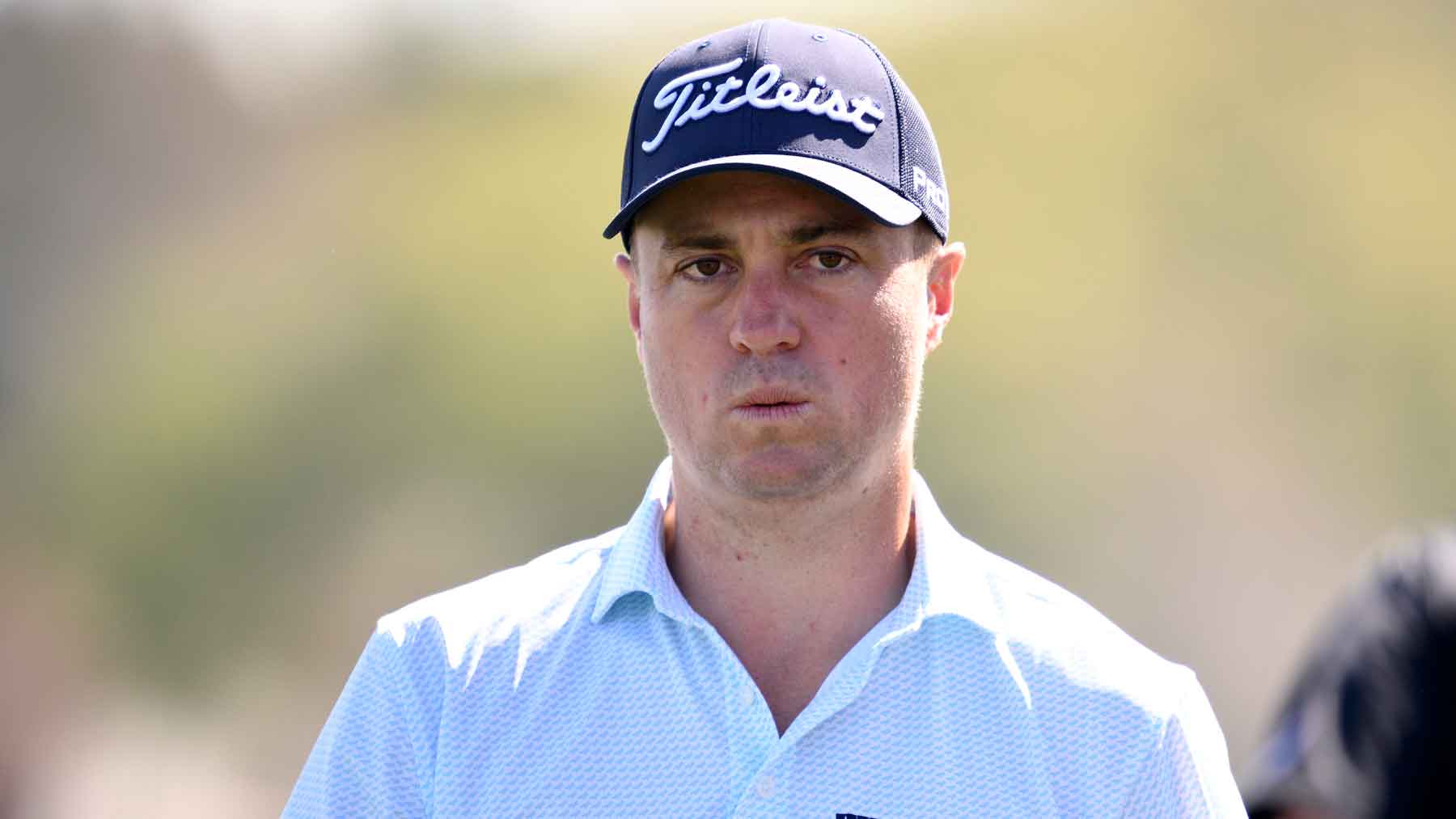 justin thomas looks into the distance
