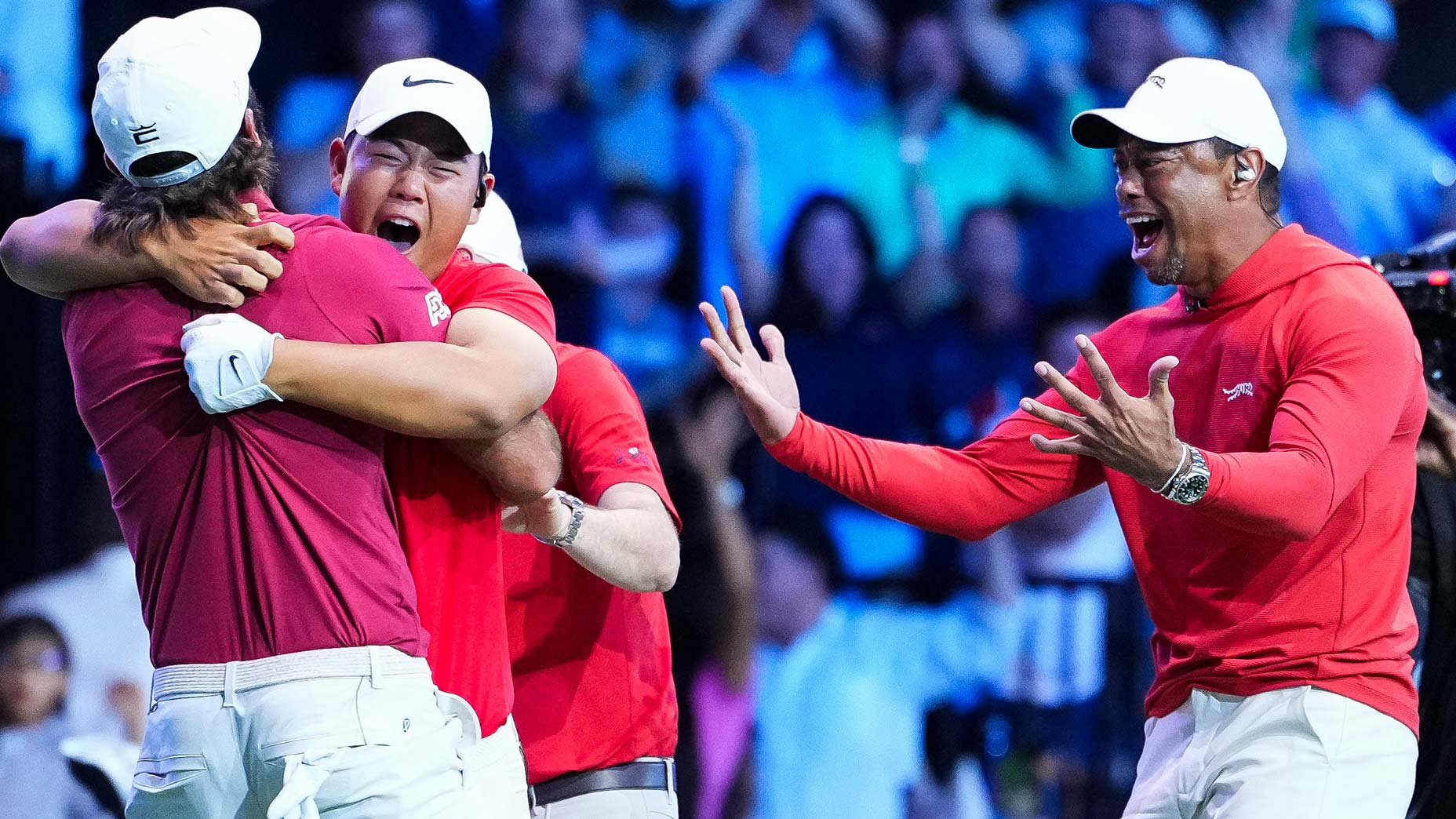 Tom Kim and Tiger Woods.