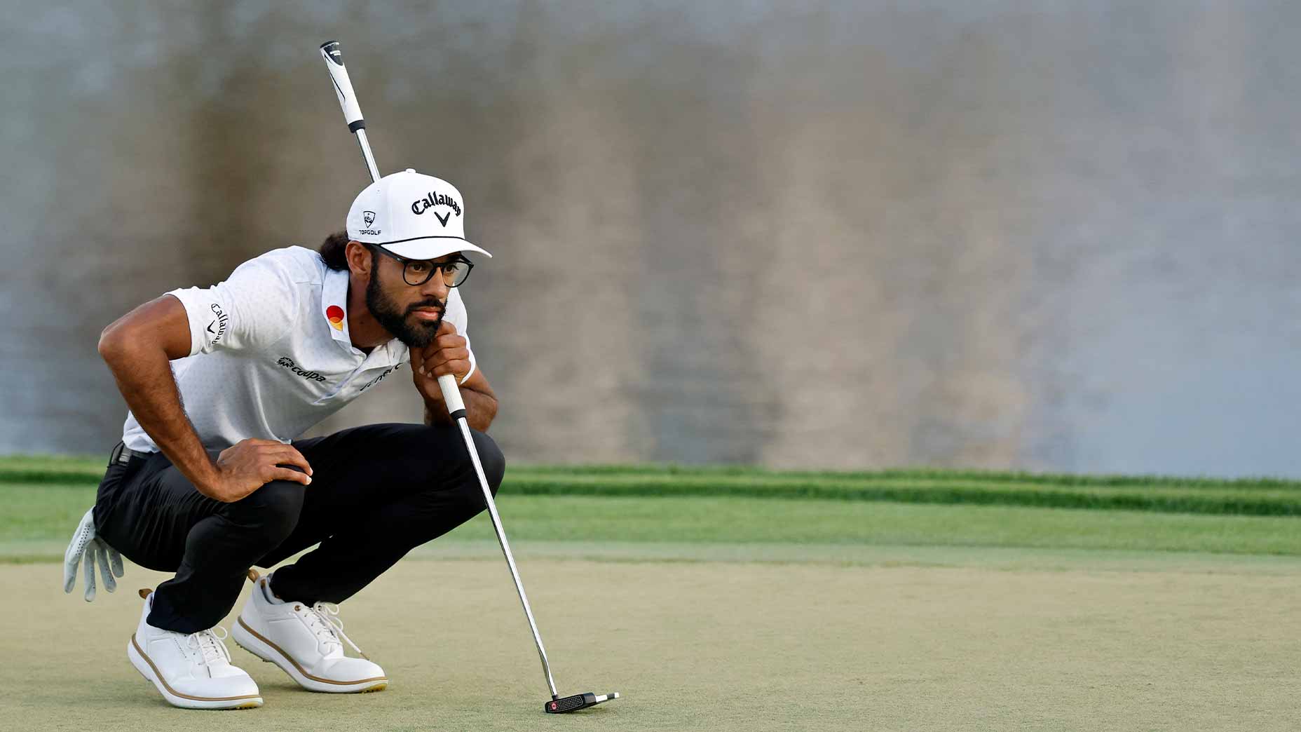 Akshay Bhatia of United States of America lines up a putt at the 18th hole during the final round of the Arnold Palmer Invitational presented by Mastercard 2026 at Arnold Palmer Bay Hill Golf Course on March 08, 2026 in Orlando, Florida. (Photo by Joe Robbins/Icon Sportswire via Getty Images)