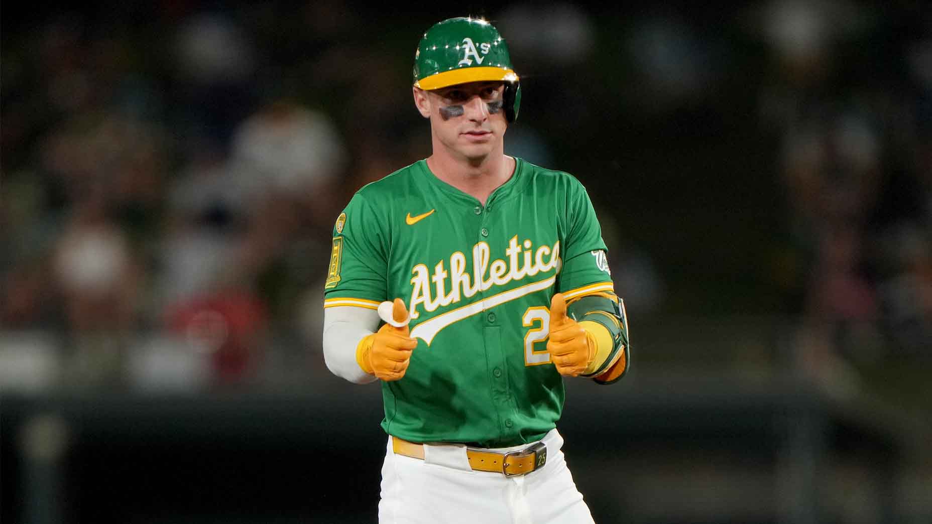 Brent Rooker gestures after hitting a double