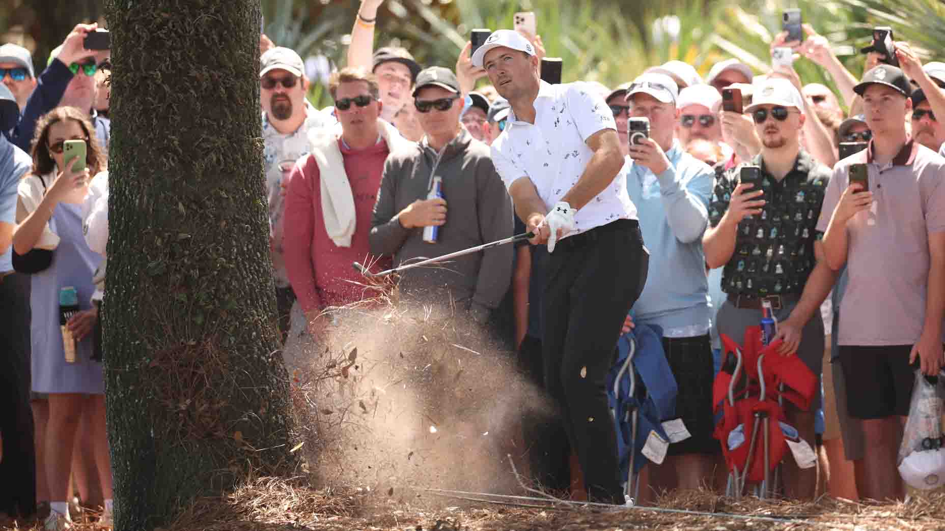 Jordan Spieth hits a shot at the Players Championship