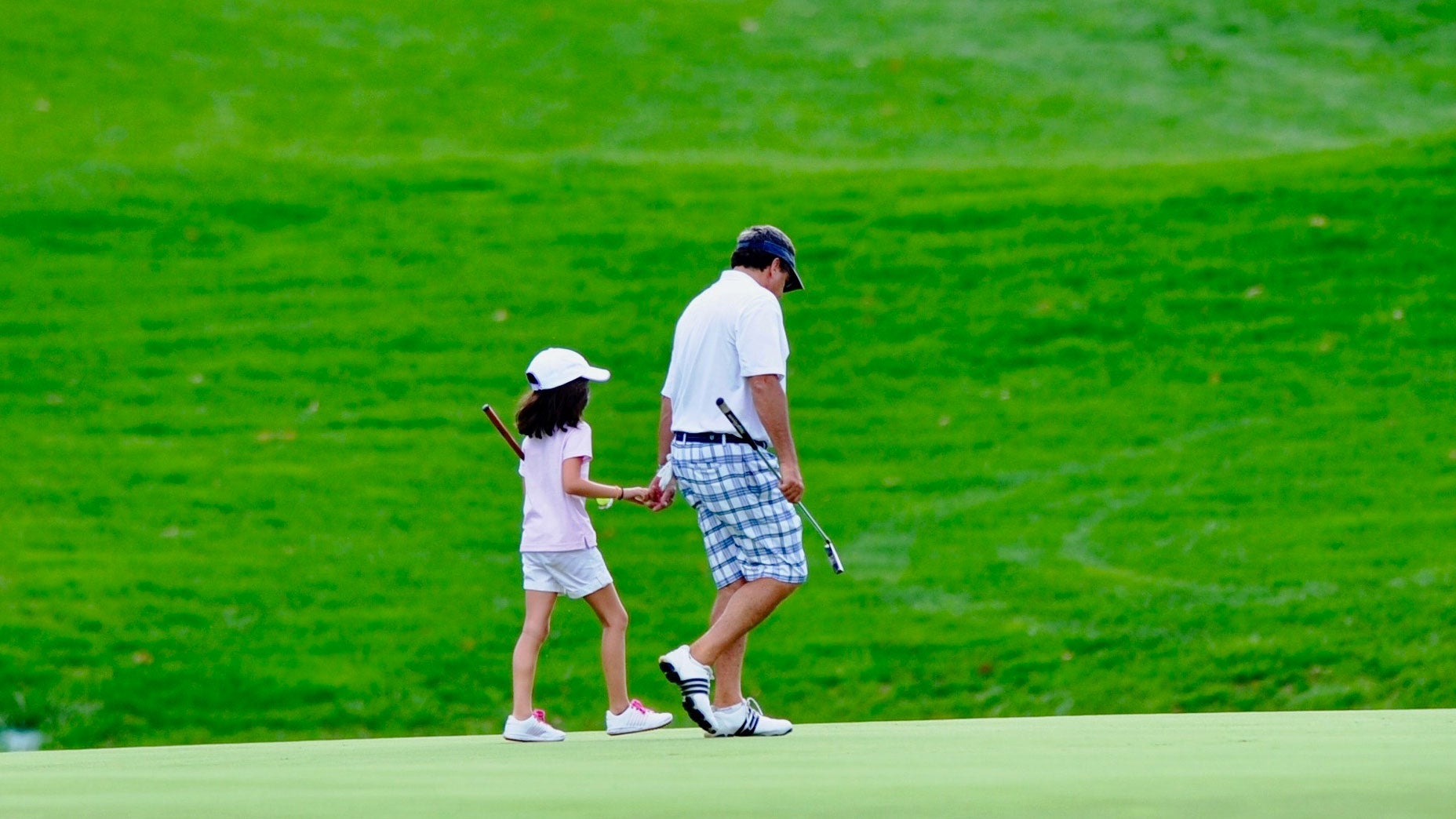 Steve Lapper on the course with his daughter, Sydney