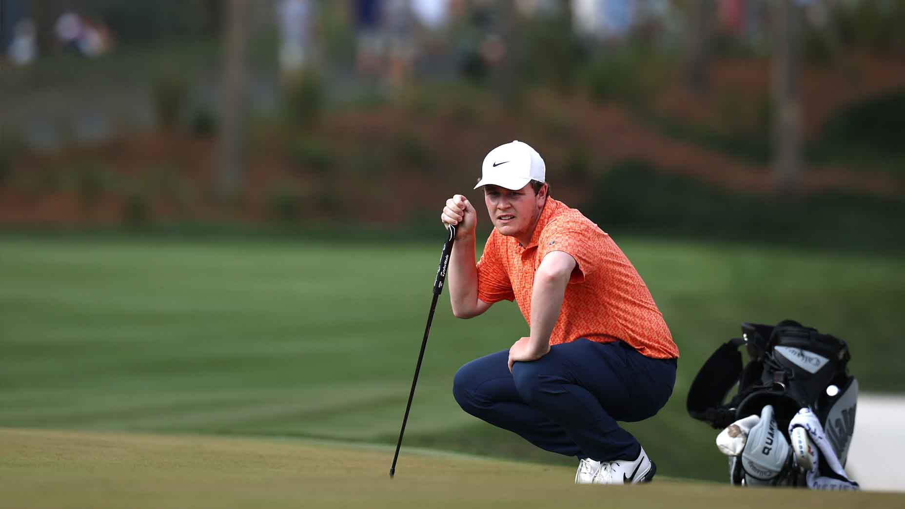 Robert MacIntyre surveys a putt at the Players Championship