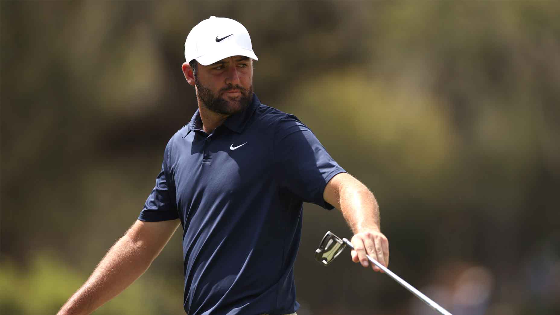 Scottie Scheffler looks on during the Players Championship