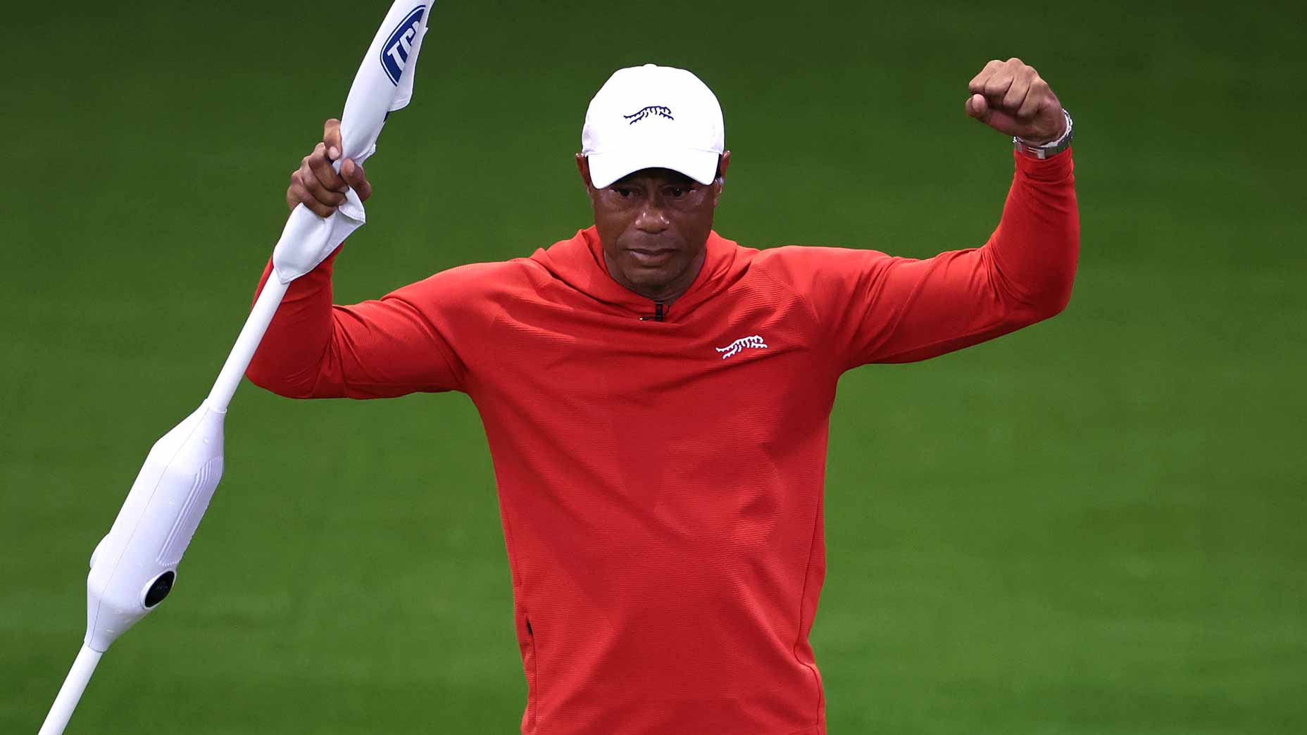 Tiger Woods celebrates during the 2026 TGL finals match.