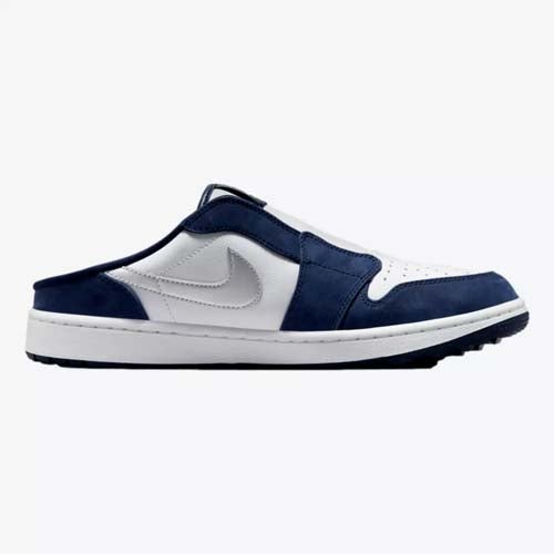A navy blue and white Nike slip-on shoe with a white swoosh logo, white midsole, and navy blue detailing, shown in side profile on a plain white background—perfect for fans of the best Jordan golf shoes looking for style and comfort.