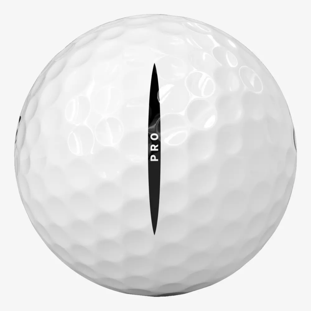 A close-up view of a white golf ball with dimples, featuring a black line and the word PRO printed vertically along the line—a perfect companion for those stepping onto the green in their best golf shoes 2026.
