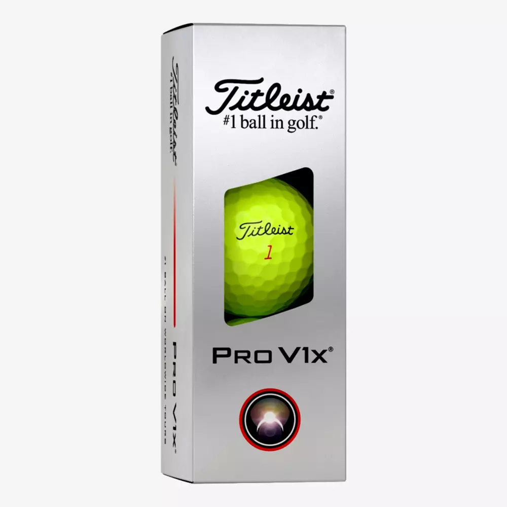 A silver box of Titleist Pro V1x golf balls with a window showing a yellow ball inside. The box is labeled Titleist #1 ball in golf and Pro V1x with a red and black circular logo—perfect for pairing with the best golf shoes 2026.