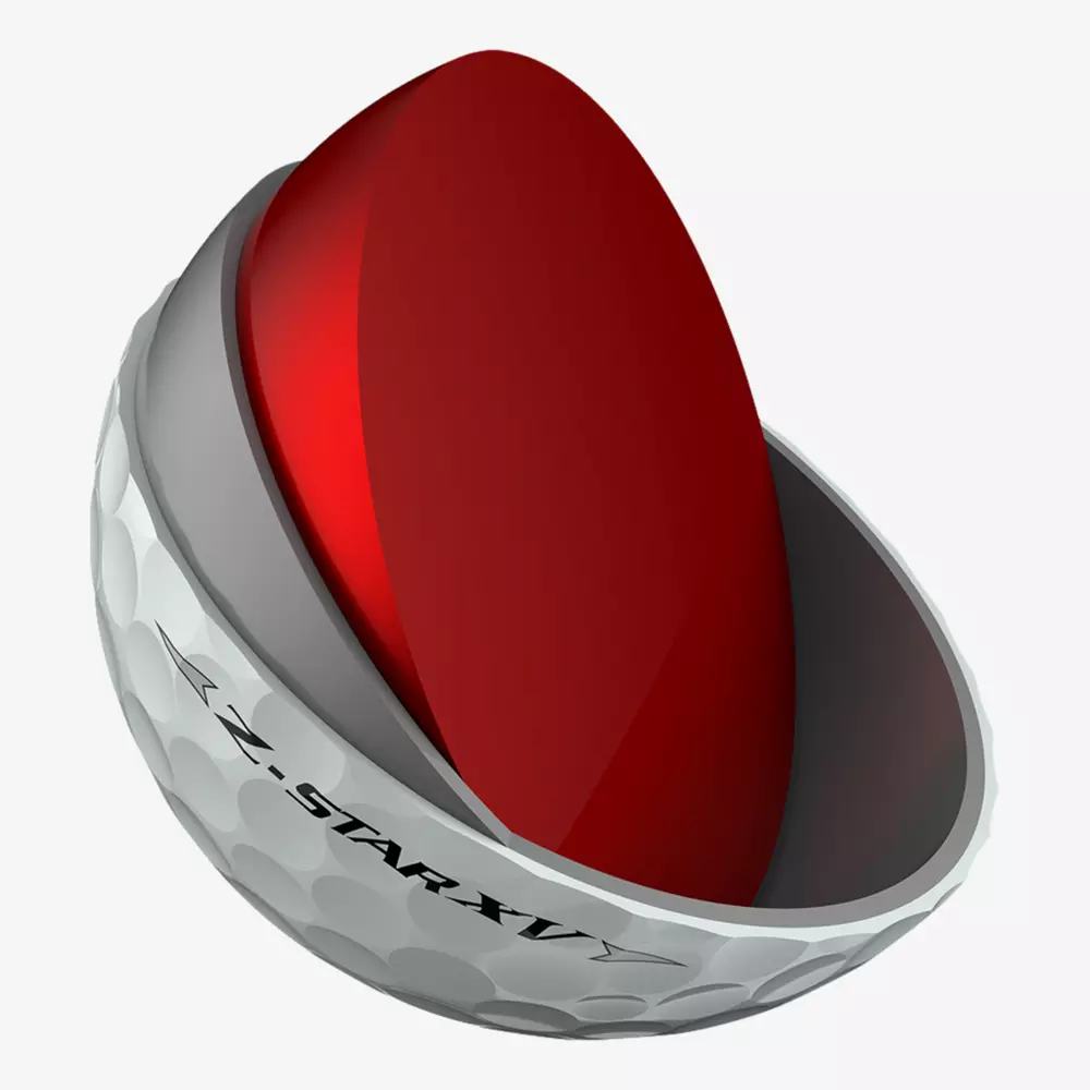 A golf ball labeled X-STAR XV, one of the best golf balls 2026, is shown in cross-section, revealing a smooth red core inside the white, dimpled outer shell.