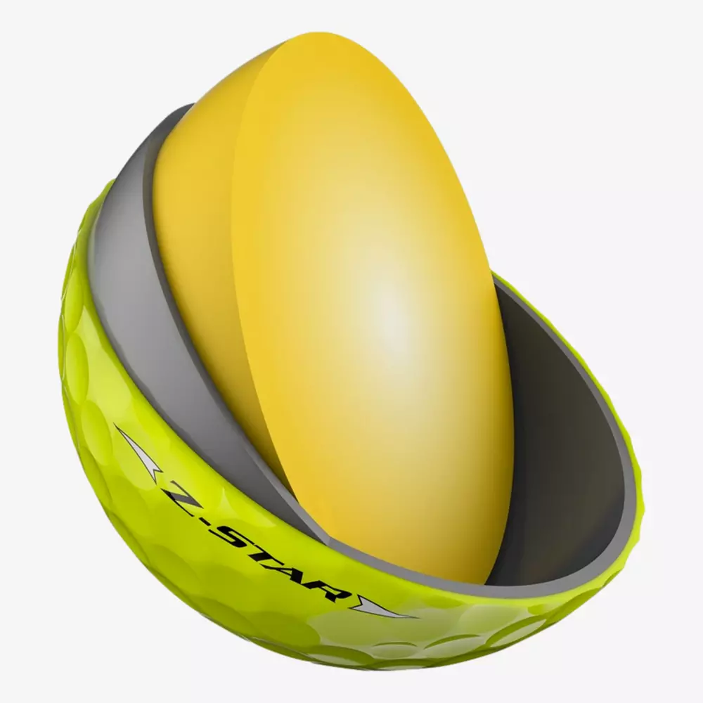 A yellow golf ball labeled Z-STAR is shown in a cross-section, revealing its layered interior structure with a yellow core and two additional layers—perfect for those seeking top performance, much like the best golf shoes 2026.
