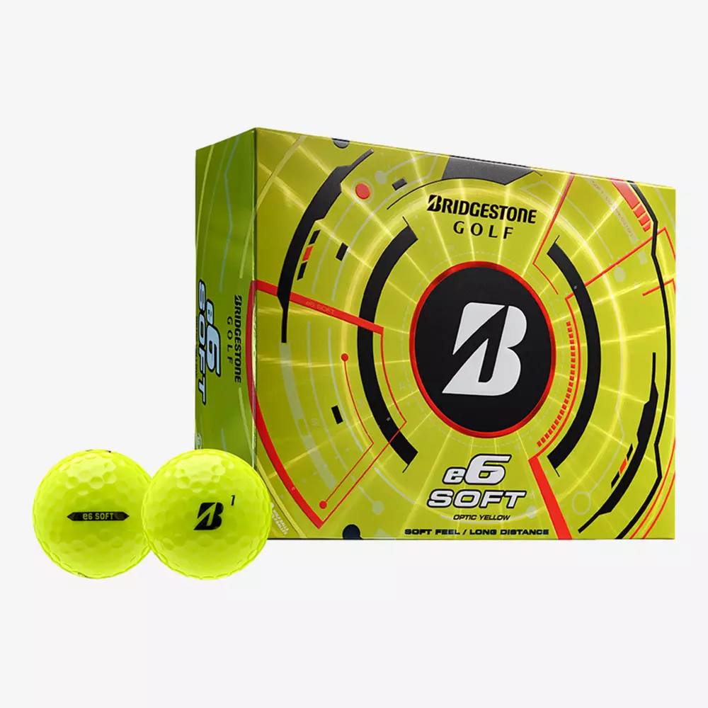 A box of Bridgestone Golf e6 Soft optic yellow golf balls with two yellow balls in front—one displaying the Bridgestone logo and the other “e6 SOFT”—perfect for pairing with your best golf shoes 2026 on the course.