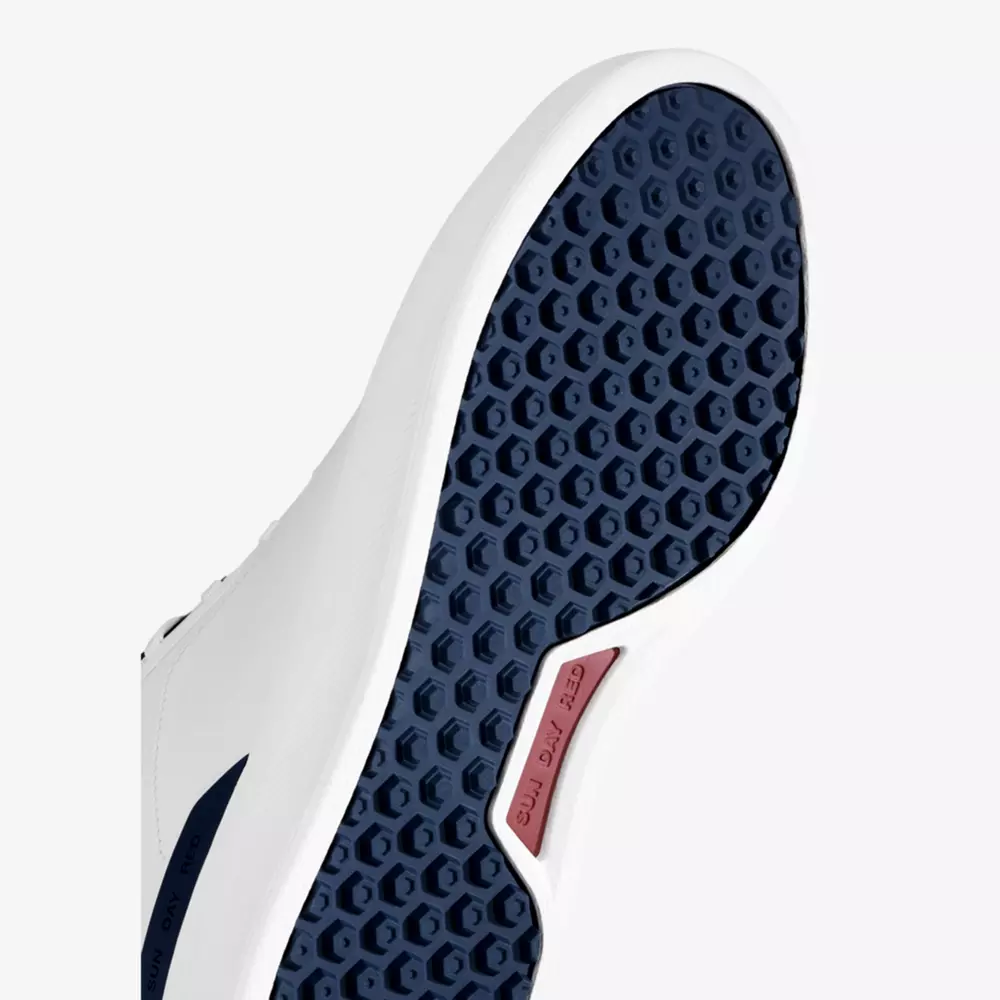 The image shows the sole of a white sneaker with a dark blue honeycomb tread pattern and a small rectangular section in the center marked GEO CUP in red, inspired by the latest designs for the best golf shoes 2026.