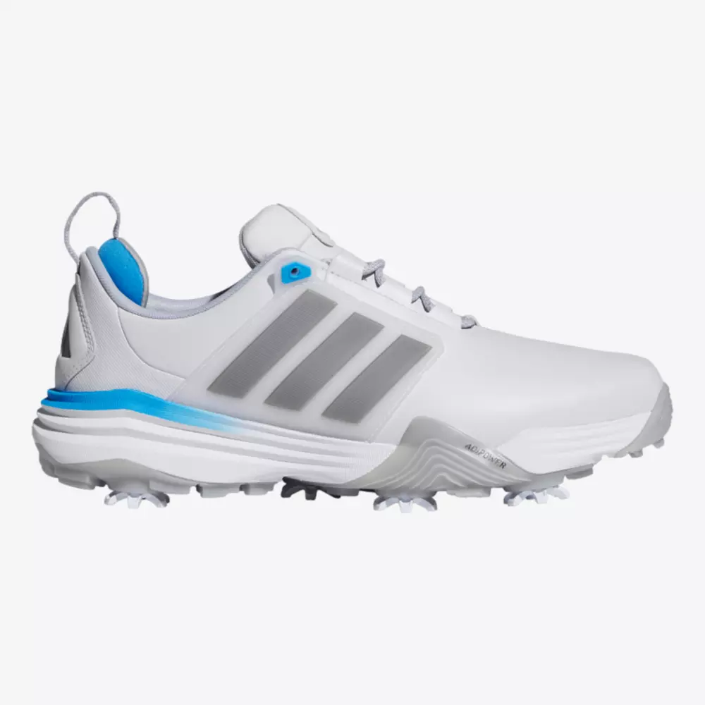 A white athletic golf shoe with gray stripes, blue accents on the heel and collar, spiked sole, and a sporty design—reminiscent of some of the best Jordan golf shoes—viewed from the side on a plain white background.