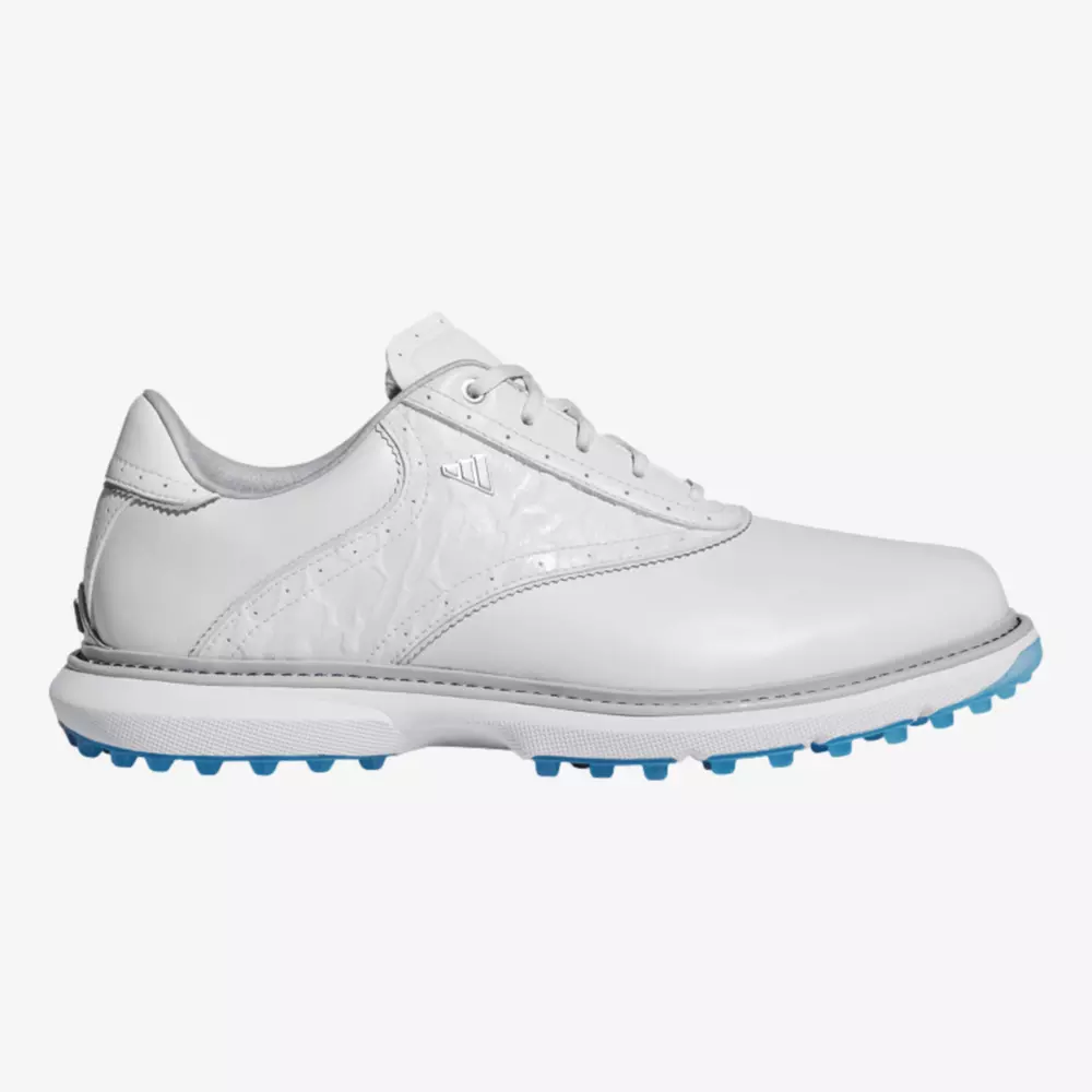 A white leather golf shoe with blue rubber spikes on the sole, featuring a low-top design and subtle stitching details, reminiscent of the best Jordan golf shoes, displayed on a plain white background.