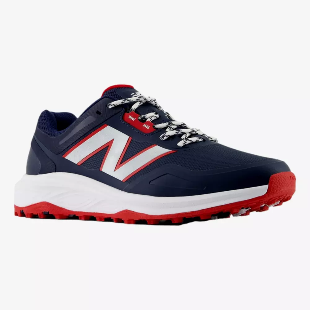 A navy blue athletic sneaker with a large white and red N logo, white and black patterned laces, a white midsole, and a red and black textured outsole—perfect for those seeking style inspired by the best Jordan golf shoes.