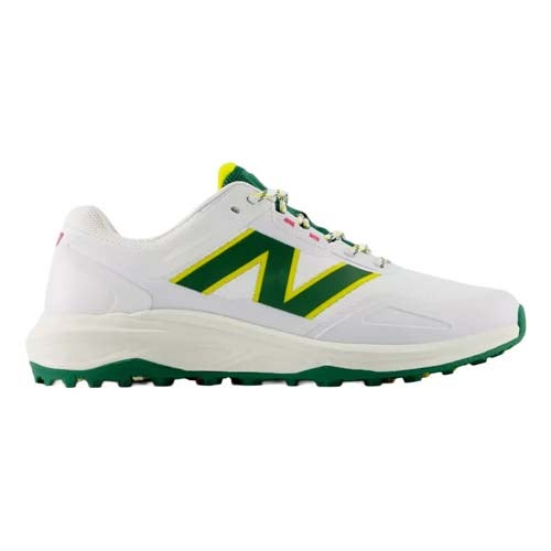 A white athletic shoe with green and yellow accents, featuring a large N logo on the side, a green outsole, and white laces—echoing some of the best looks from The First Major. Sporty design perfect for running or casual wear.