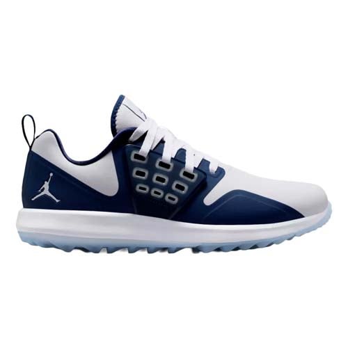 A white and navy blue athletic sneaker with white laces, a translucent sole, and the Jumpman logo on the heel. Featuring mesh detailing and a pull tab at the back, it's inspired by the best Jordan golf shoes for style and performance.