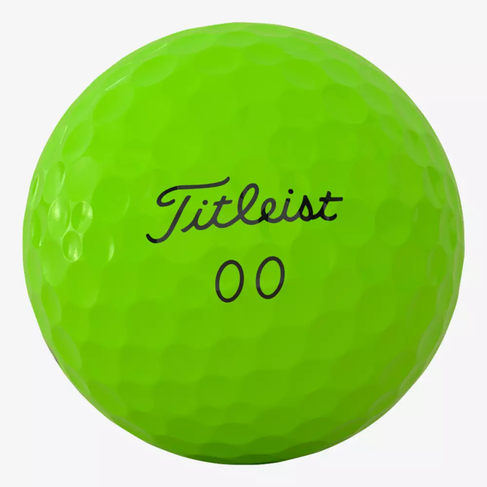 A bright green Titleist golf ball with dimpled texture, featuring the Titleist logo and the number 00 printed in black on its surface—a perfect match for players wearing the best golf shoes 2026.
