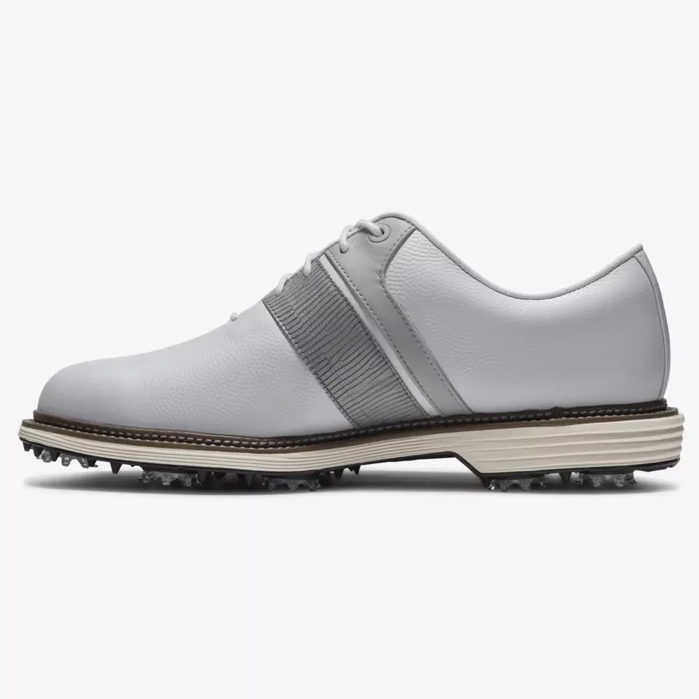 A white leather golf shoe with gray accents, lace-up closure, textured side panel, and spiked black rubber sole for optimal traction—an ideal choice for those seeking the best Jordan golf shoes on the course.