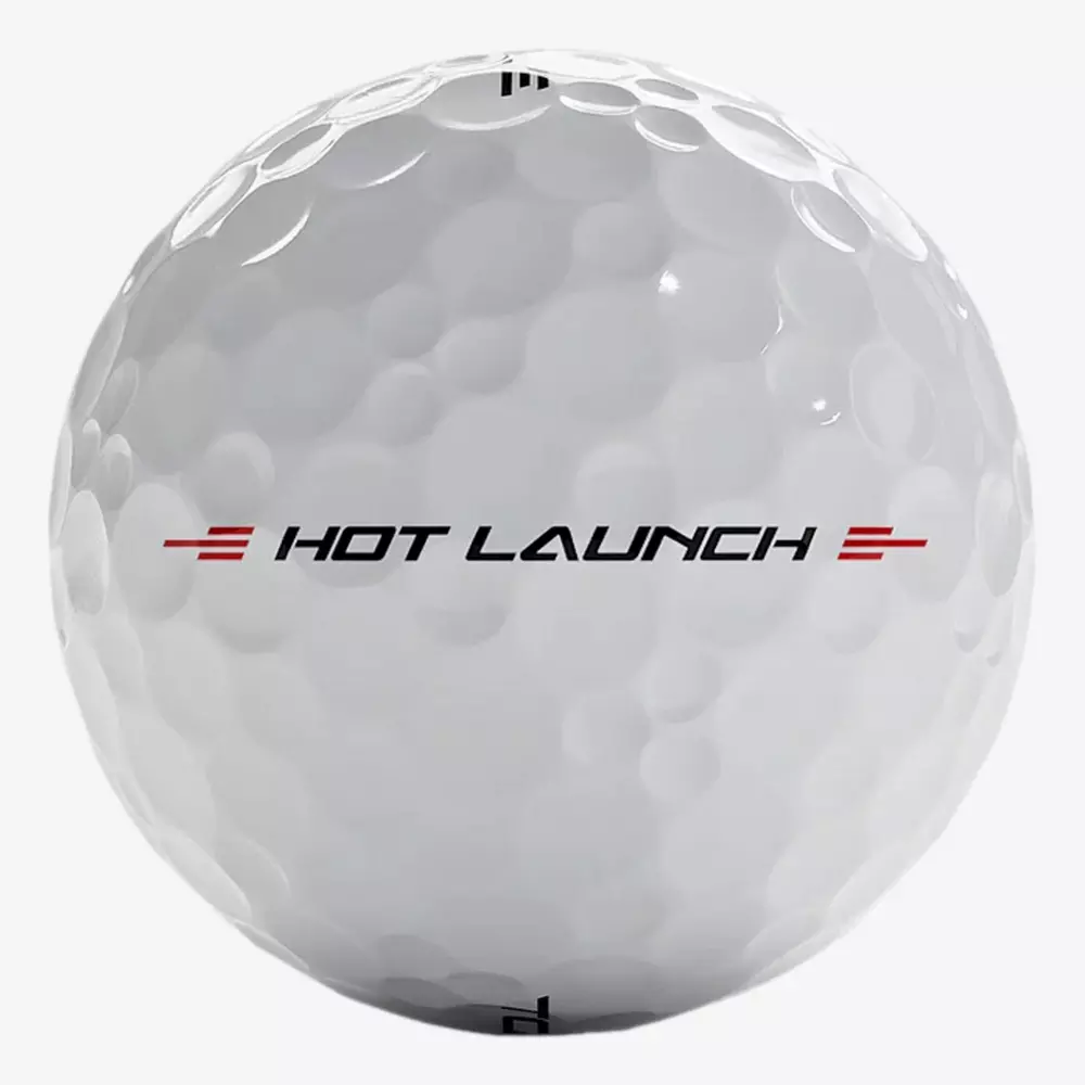 A white golf ball with visible dimples and the words HOT LAUNCH printed in black and red on its surface—perfect for pairing with the best golf shoes 2026 for an unbeatable game.