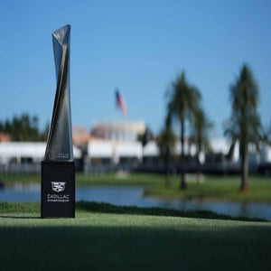 Trophy sits on a grassy area at Trump Doral golf course: 2026 Cadillac Championship Thursday TV coverage