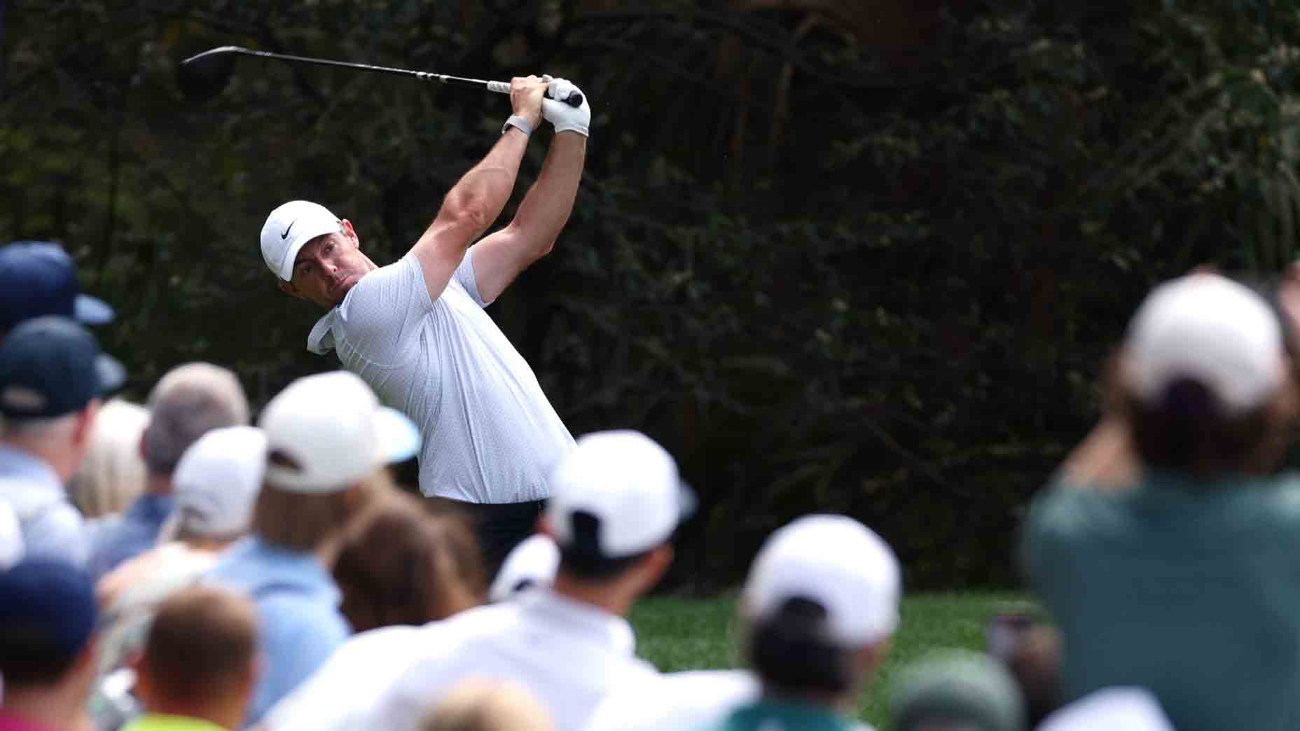 Rory McIlroy hits shot at Masters at Augusta National.