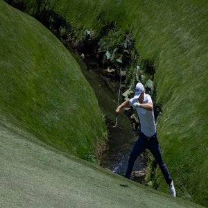 Jordan Spieth gets a Participation Jacket &mdash;&nbsp;and not just because he jumped over this creek.