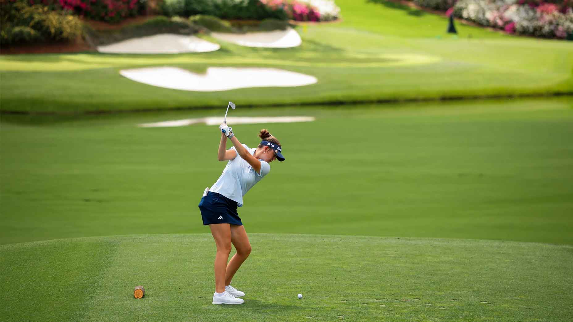 Asterisk Talley hits a tee shot at Augusta National